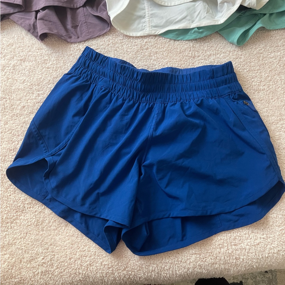 8 Pairs of Lululemon Tracker 4in Mid Rise Shorts